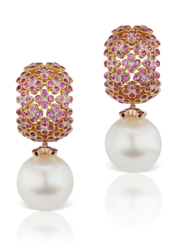 The hydrangea earrings by Alexia Connellan. Pink sapphires and diamonds in pink and peach gold with South Sea pearls.