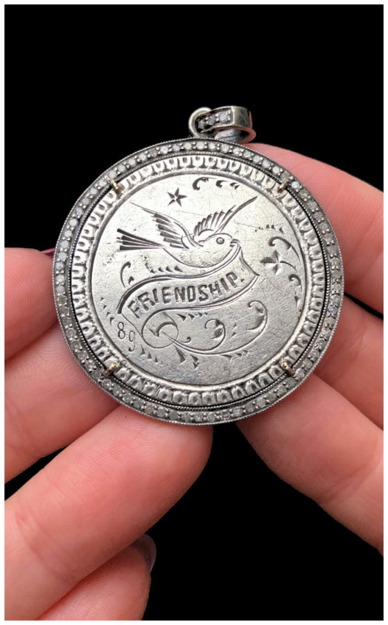 An extraordinary Victorian era love pendant token by Heavenly Vices! This one is engraved with the word 'Friendship' and set with diamonds.