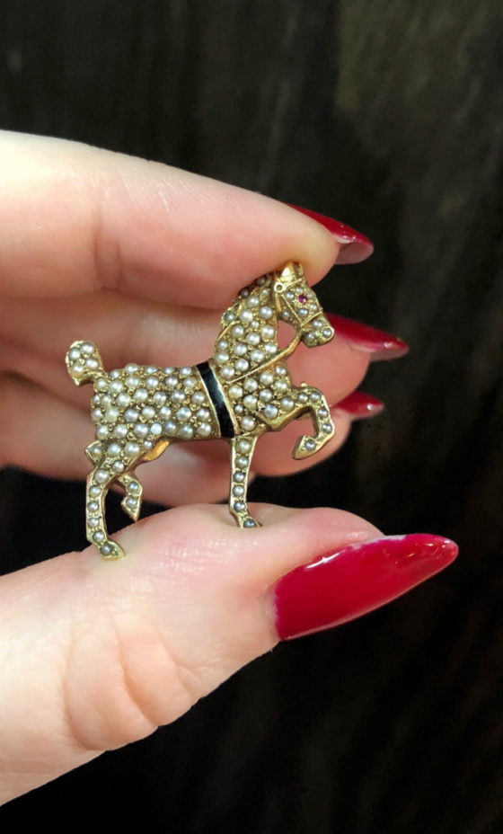 A lovely antique horse brooch with pearls. From Wilson's Estate Jewelry.