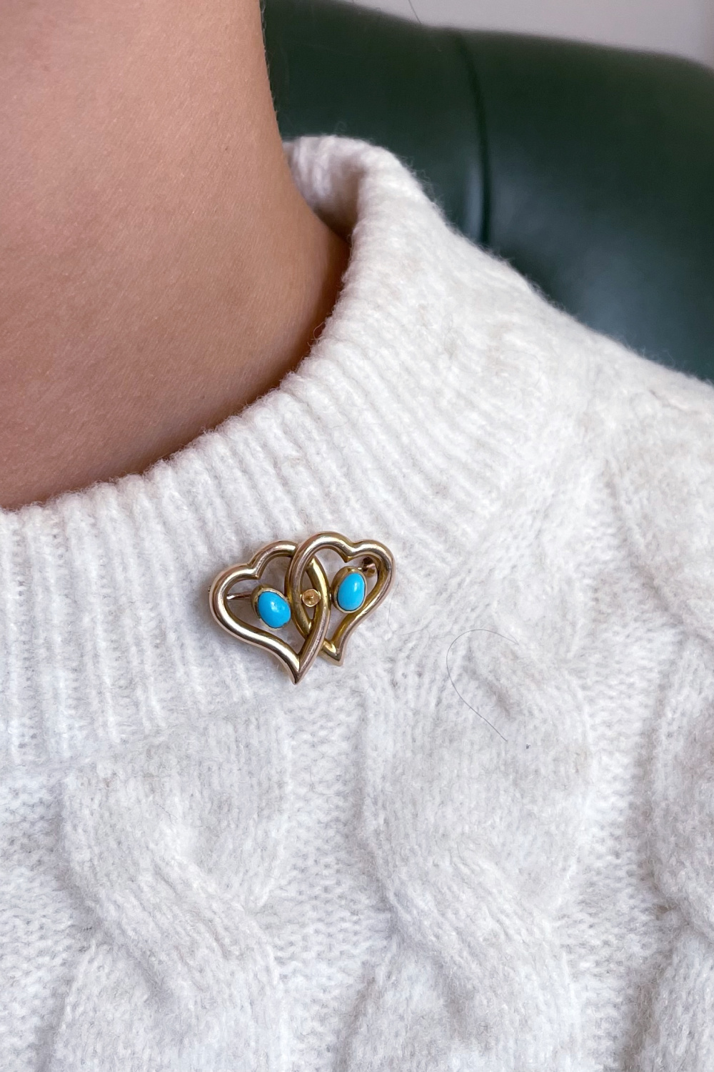 A late 19th century 15k gold turquoise double heart brooch sold in a Fellows jewelry auction