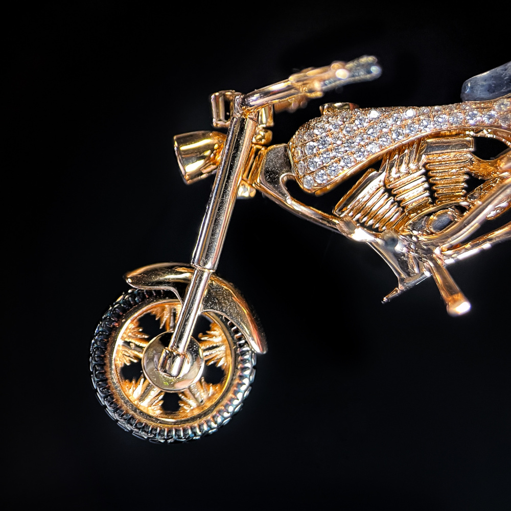 18K rose gold Harley Davidson motorcycle handmade by Rodney Rahmani of Brilliant Stars. With sapphires and diamonds.