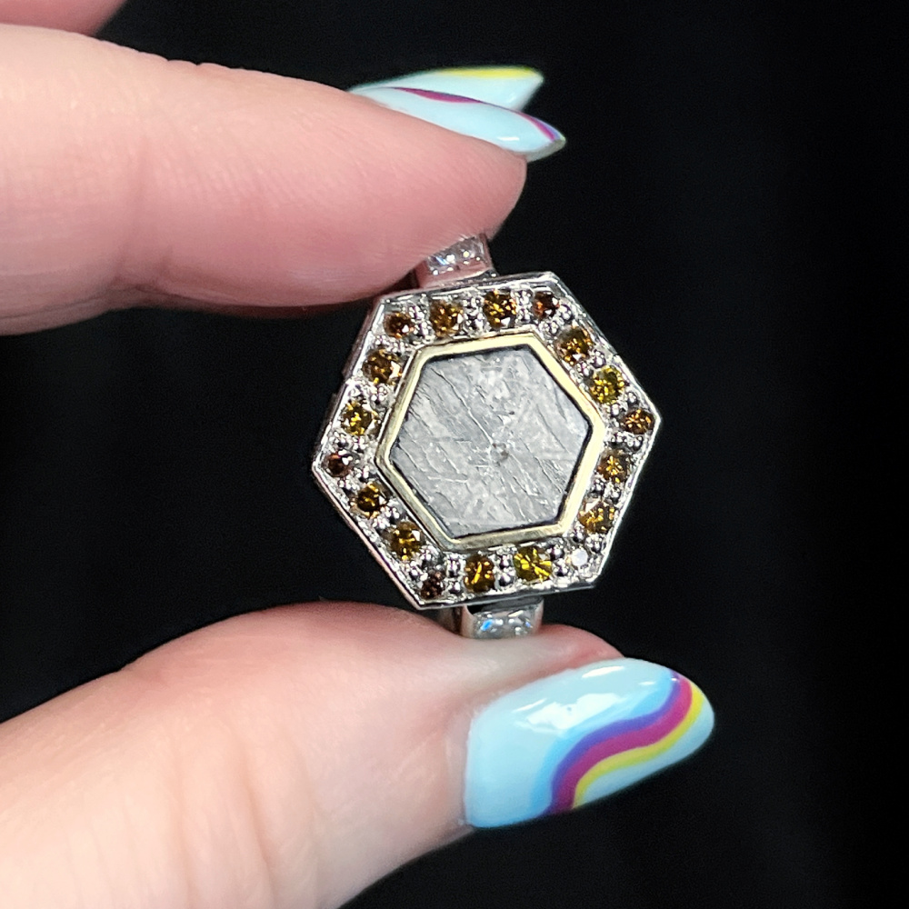 Platinum and Meteorite ring by Sheridan Conrad of A Jewelers' Art,  with a 4.20 ct hexagonal-cut Meteorite in gold with Diamonds. 