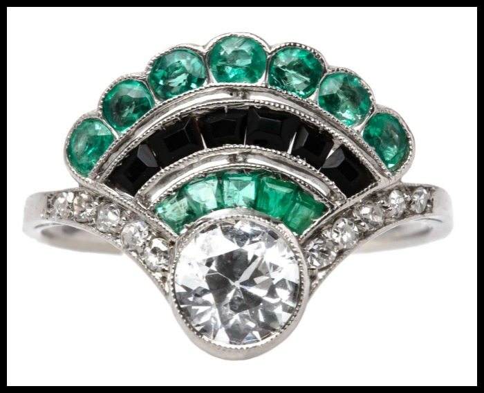 Antique Art Deco fan ring with diamonds, emeralds, and onyx. Diamonds